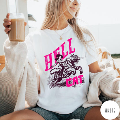 Comfort Colors tee in White featuring retro design of a cowgirl riding a tiger with pink text