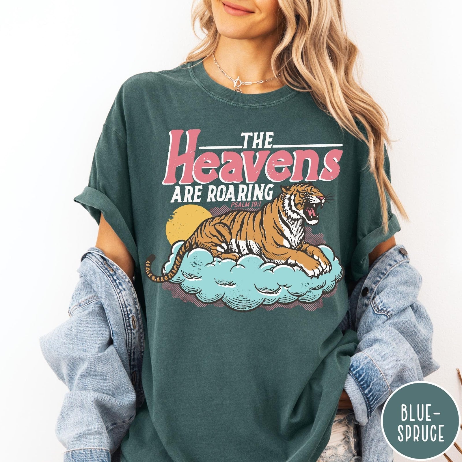 Comfort Colors tee in Blue Spruce featuring vintage style graphic of a roaring tiger on a cloud