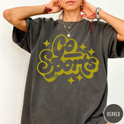 Comfort Colors tee in Pepper featuring retro sports style graphic with Go Sports text and star accents
