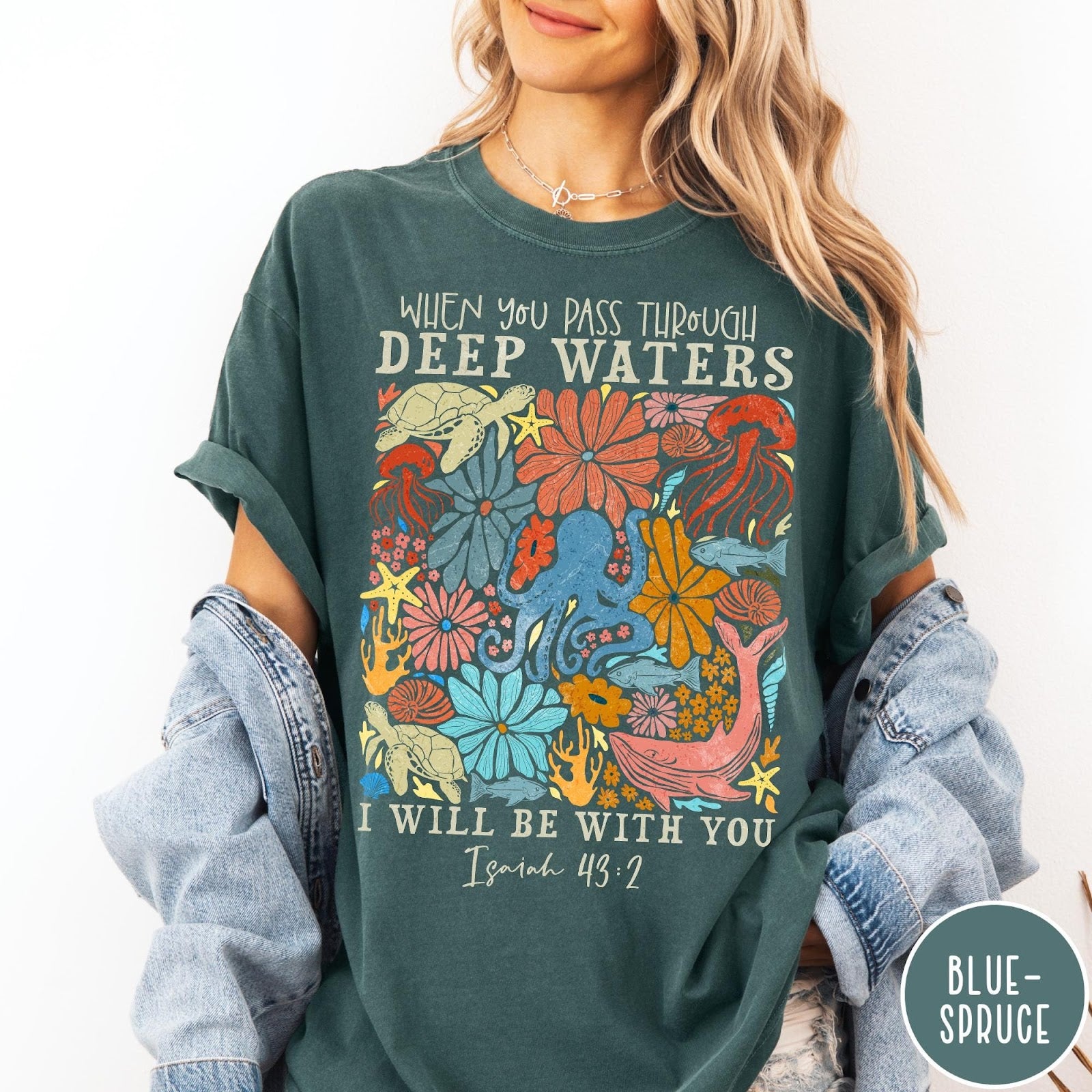 Comfort Colors tee in Blue Spruce featuring retro style ocean life graphic with Isaiah 43:2 Bible verse text
