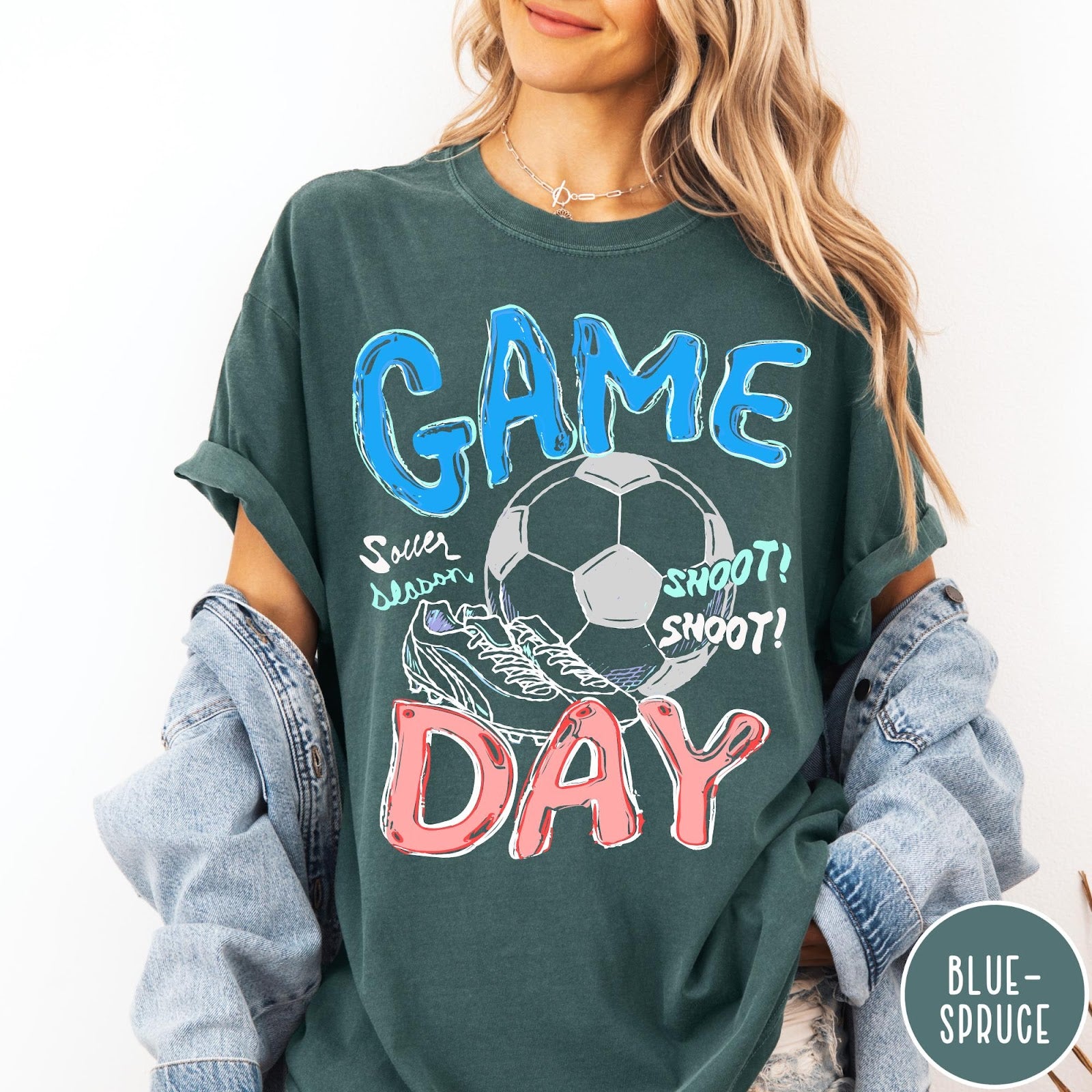 Comfort Colors tee in Blue Spruce featuring soccer graphic with ball, cleats, and Game Day typography design