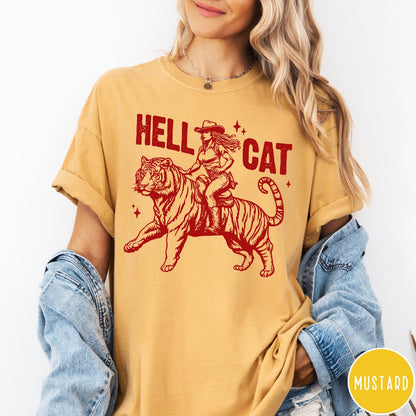 Comfort Colors tee in Mustard featuring western style graphic of a cowgirl riding a tiger