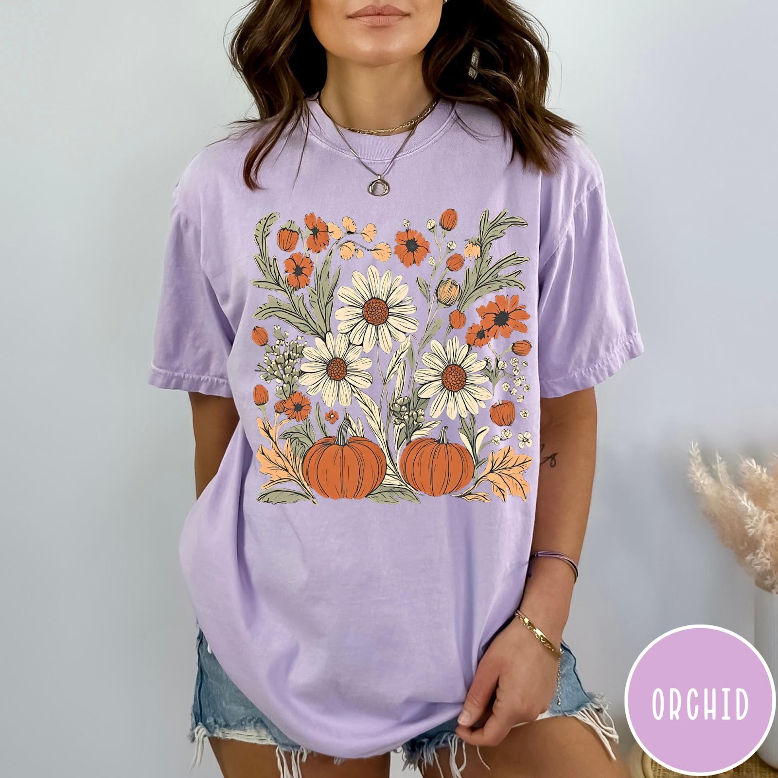 Comfort Colors tee in Orchid featuring boho floral design with pumpkins and daisies in fall colors