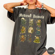 Comfort Colors tee in Pepper featuring medieval fantasy style graphic of nine various animals in knightly attire