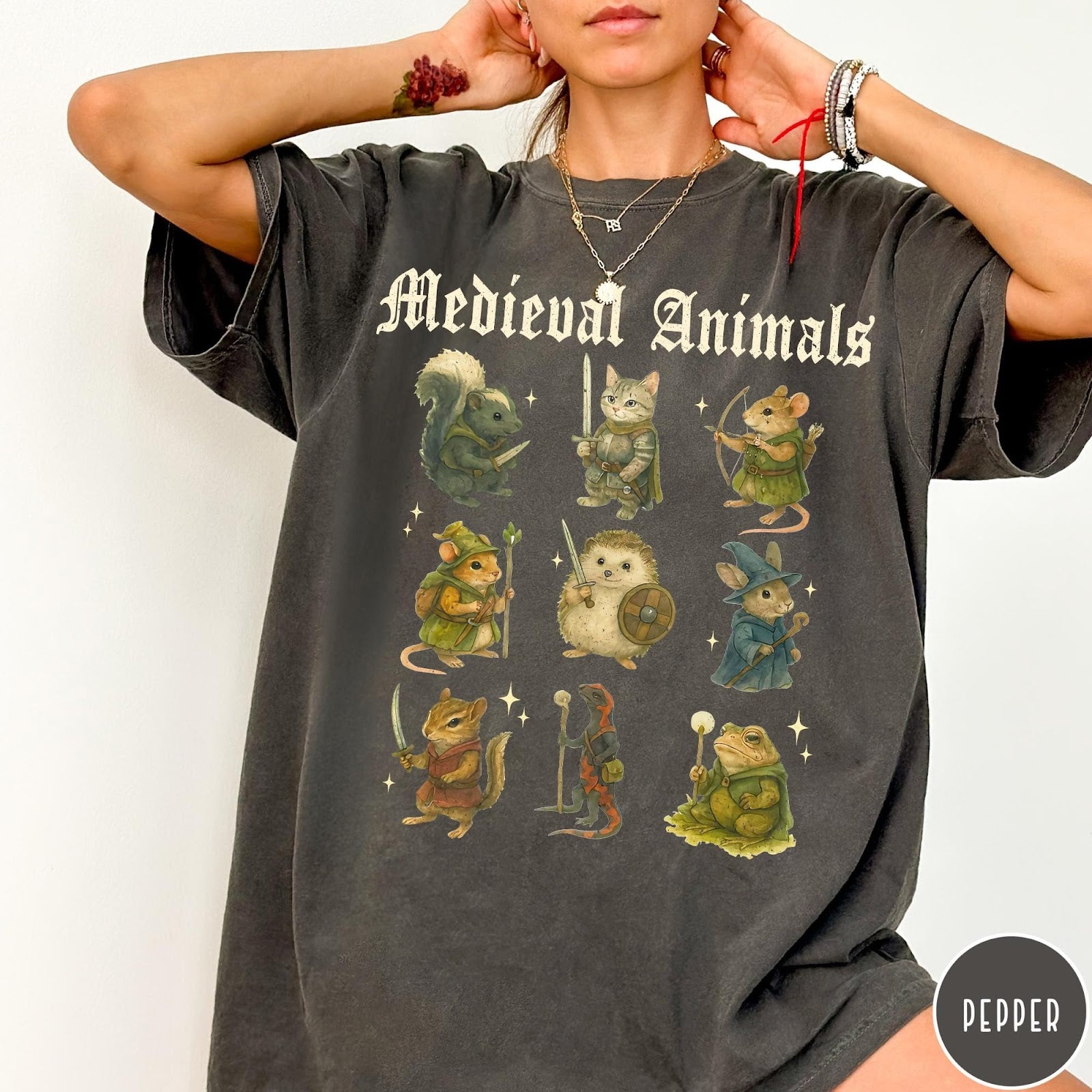 Comfort Colors tee in Pepper featuring medieval fantasy style graphic of nine various animals in knightly attire