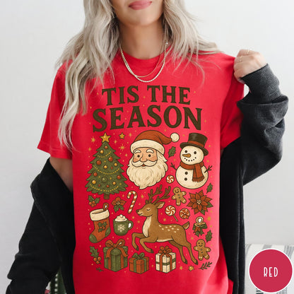 Comfort Colors tee in Red featuring Christmas collage graphic with Santa, snowman, reindeer, and holiday gifts