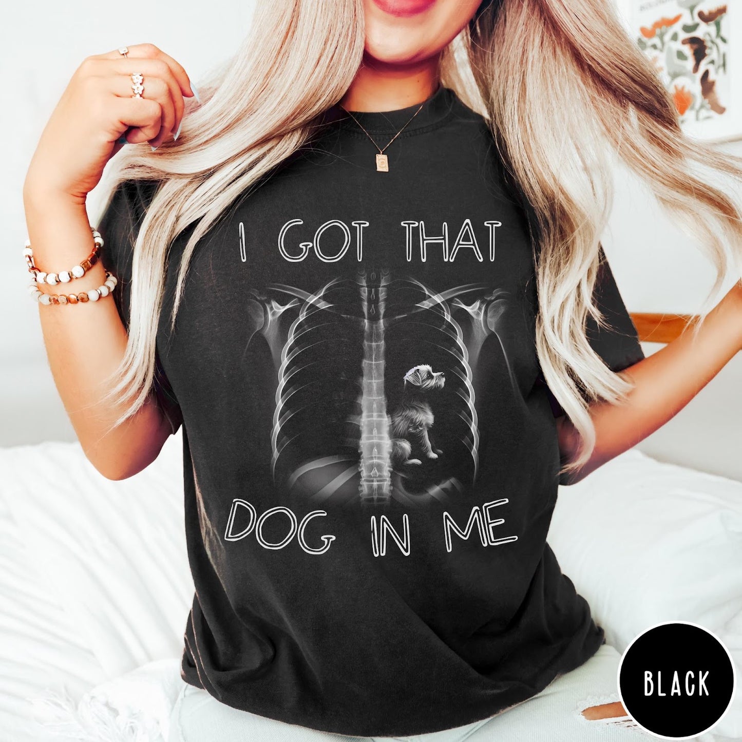 Comfort Colors tee in Black featuring graphic style X-ray ribcage with a small dog sitting inside.