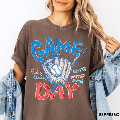 Comfort Colors tee in Espresso featuring baseball design with glove, ball, bat, and Game Day text graphic