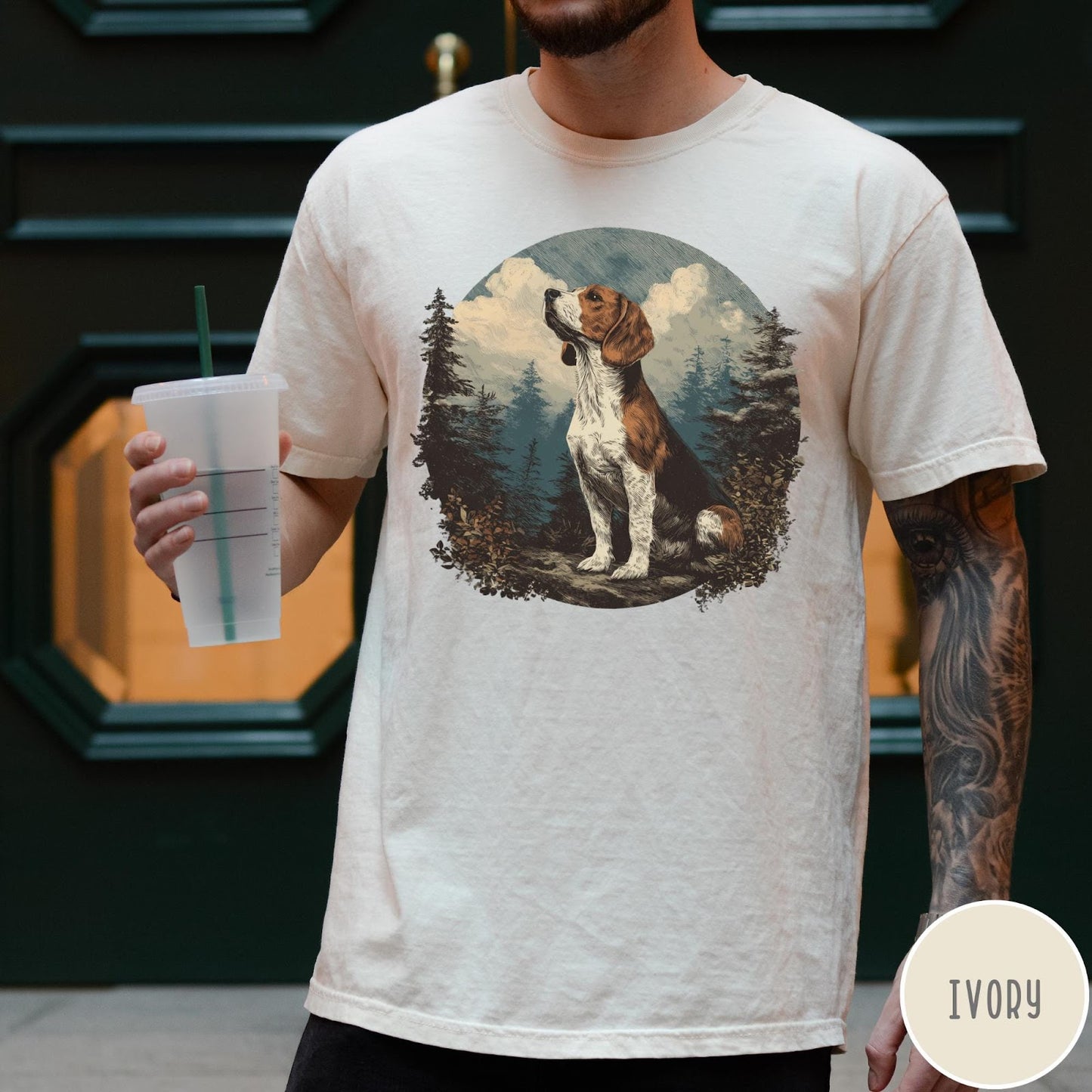 Comfort Colors tee in Ivory featuring vintage style graphic of a beagle sitting in a forest scene