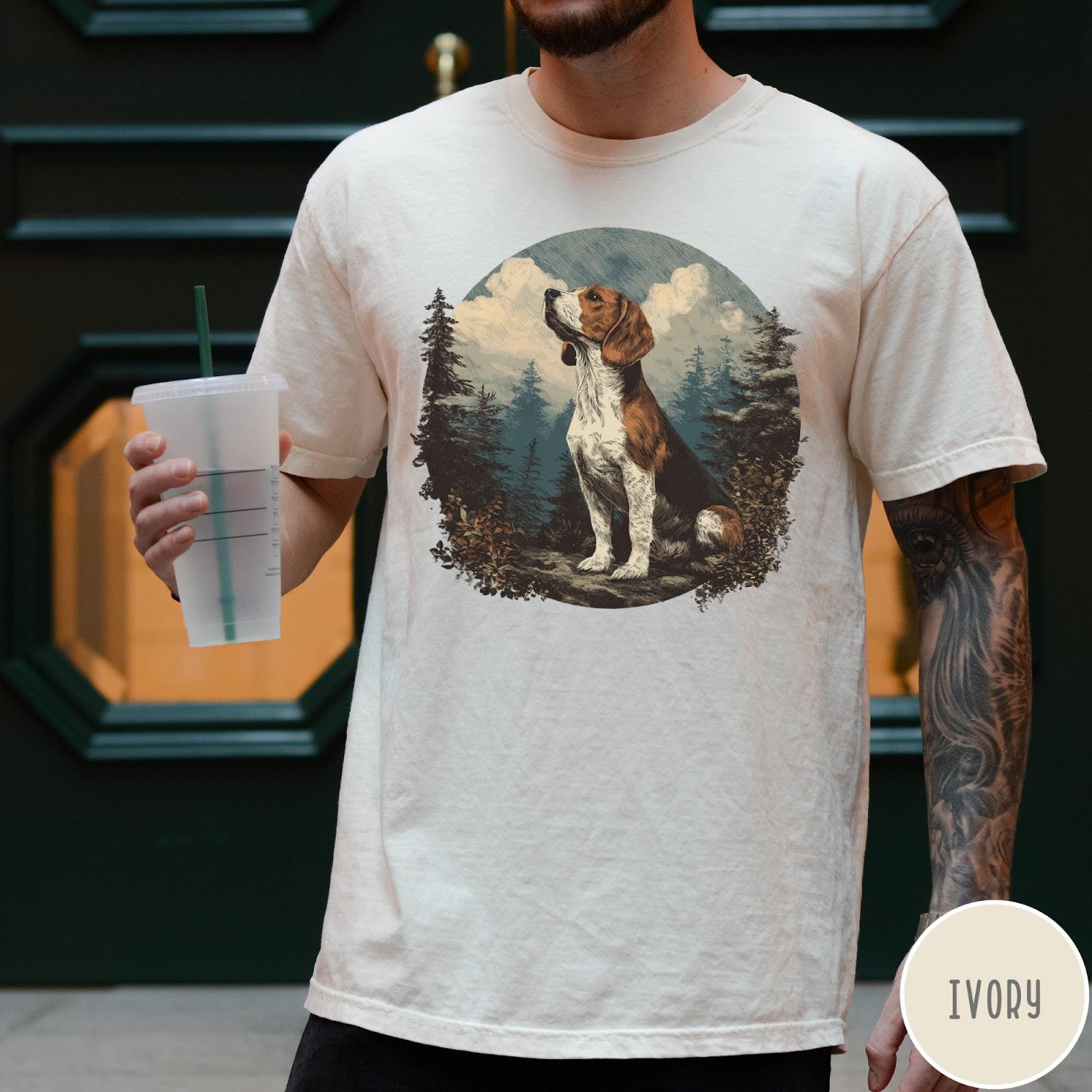 Comfort Colors tee in Ivory featuring vintage style graphic of a beagle sitting in a forest scene