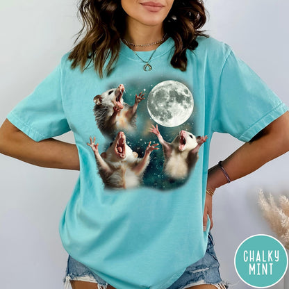 Comfort Colors tee in Chalky Mint featuring vintage graphic style with three screaming possums reaching for the moon