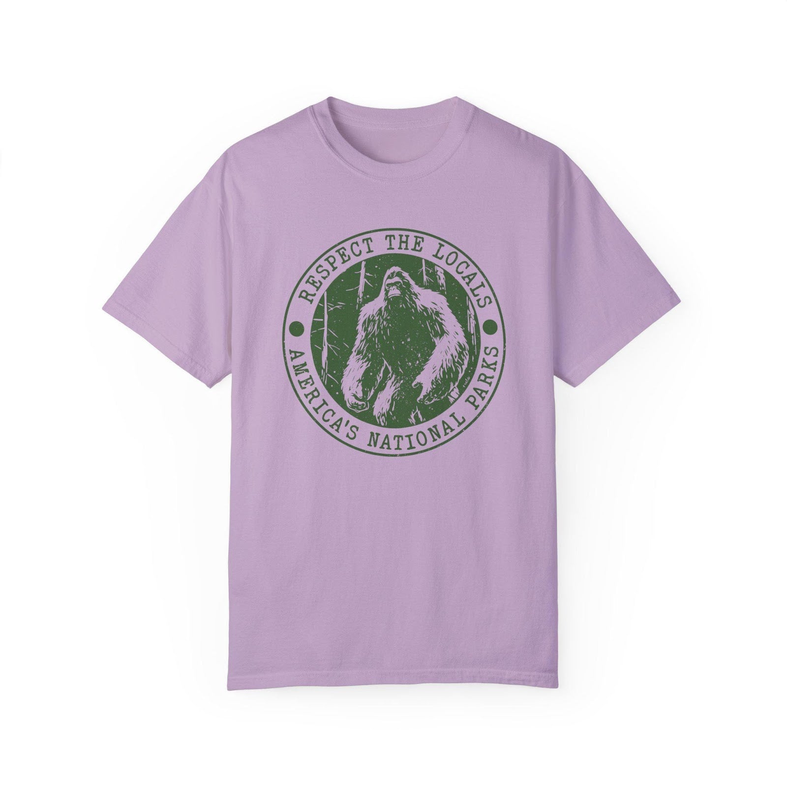 Comfort Colors tee in Orchid featuring circular graphic design with Bigfoot and Respect the Locals text