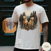 Comfort Colors tee in Ivory featuring vintage style graphic of two golden labrador dogs in a forest