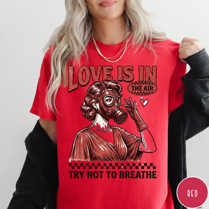 Comfort Colors tee in Red featuring retro graphic design of a woman wearing a gas mask