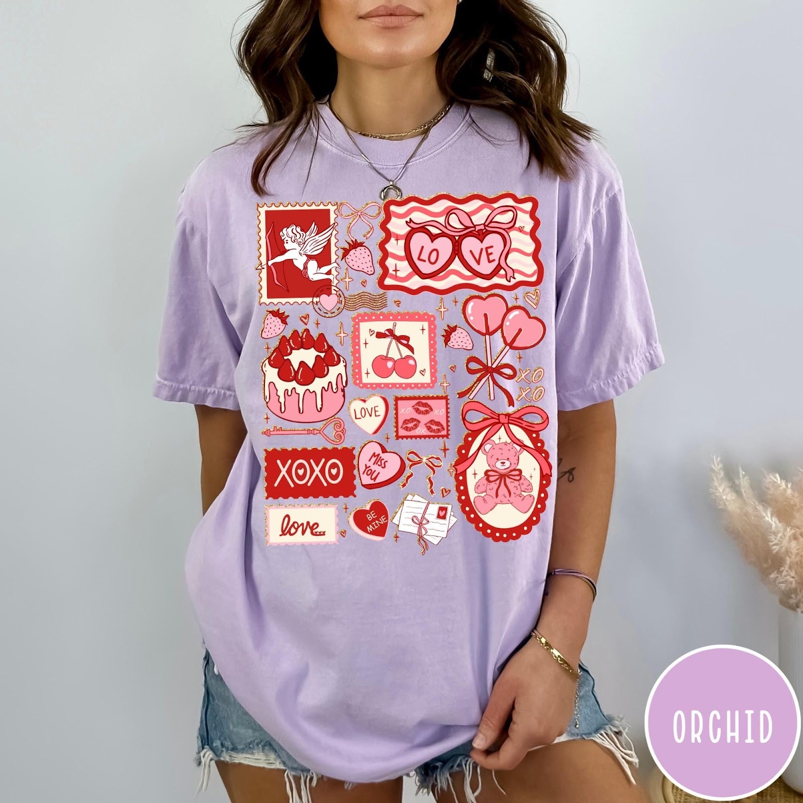 Comfort Colors tee in Orchid featuring vintage collage design with cupid, teddy bear, and Valentine's Day icons