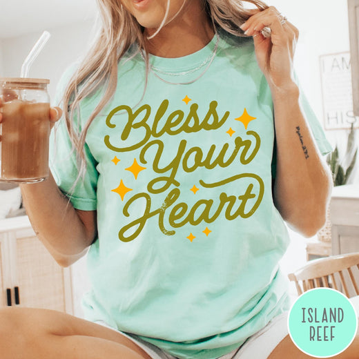 Comfort Colors tee in Island Reef featuring script lettering and star accents with the phrase Bless Your Heart