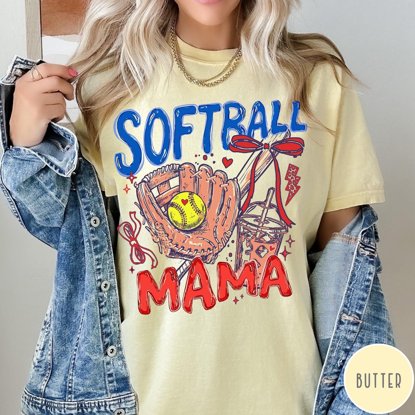 Comfort Colors tee in Butter featuring softball mom graphic with glove, ball, and iced coffee design
