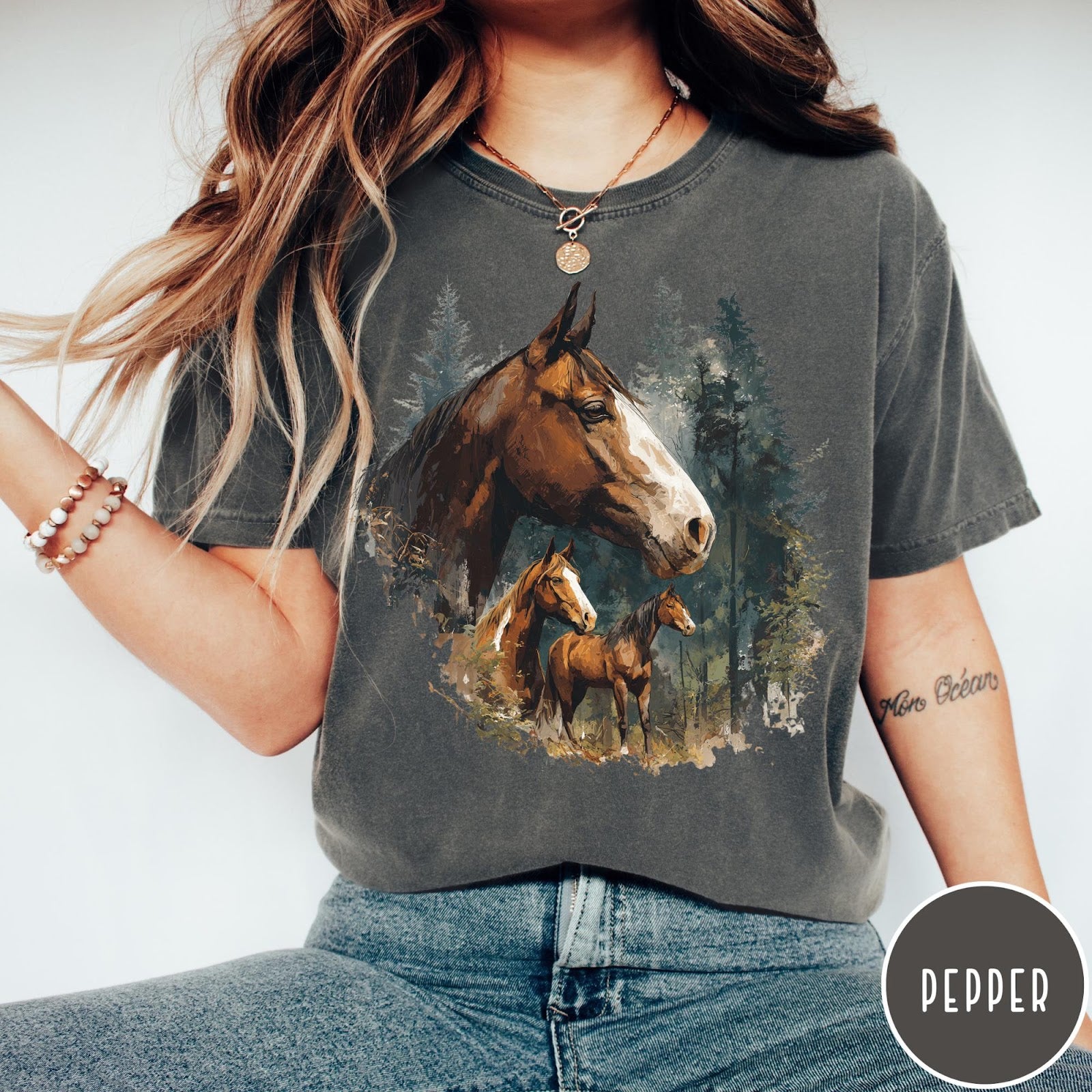 Comfort Colors tee in Pepper featuring vintage style graphic of three horses standing in a pine forest