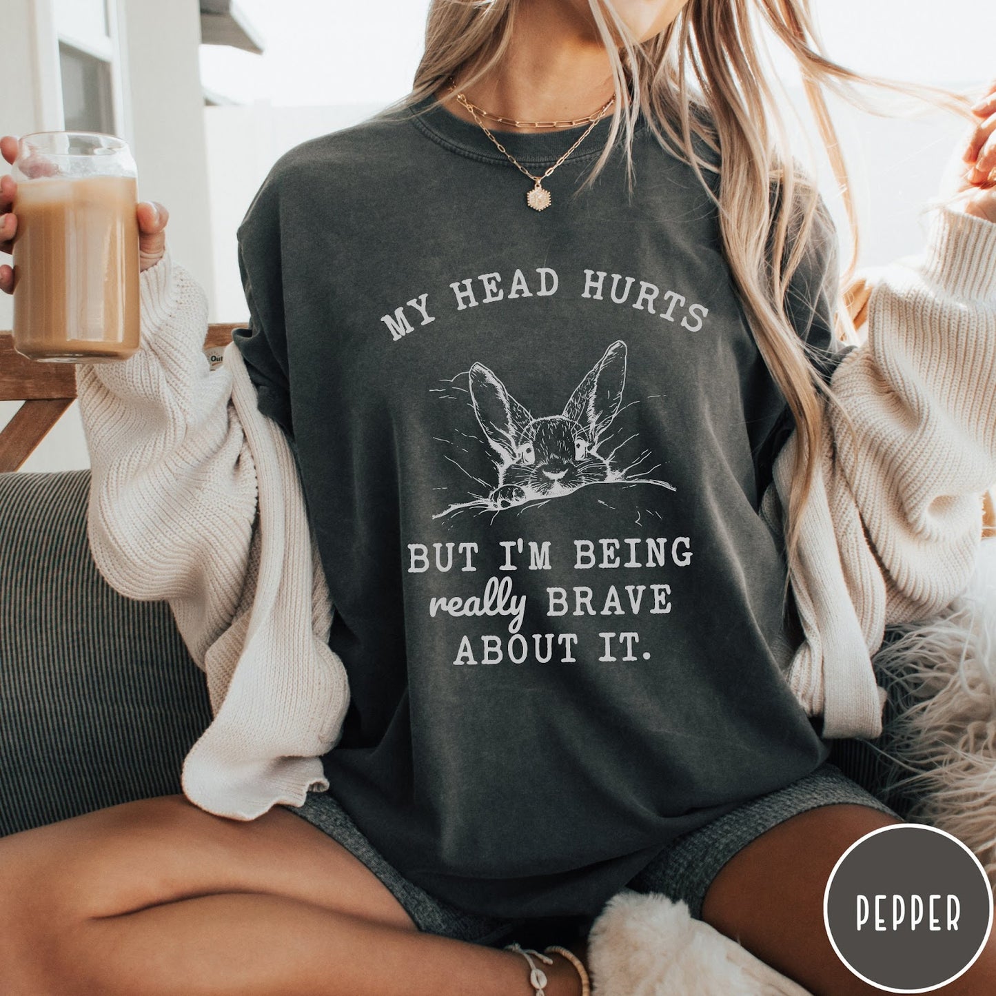 Comfort Colors tee in Pepper featuring line art graphic of a bunny resting its head on a pillow