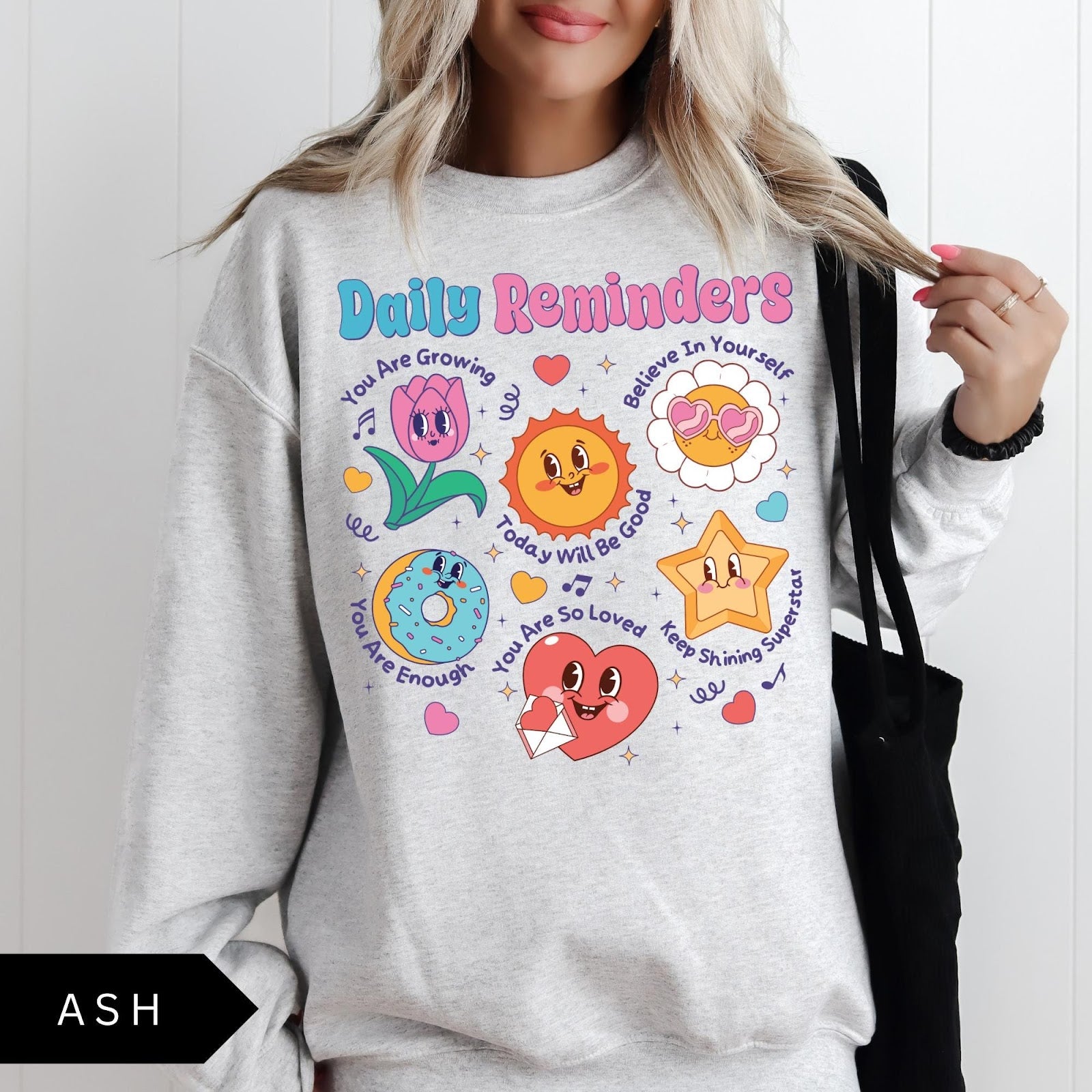 Comfort Colors tee in Ash featuring retro mascot design with daily affirmations and colorful graphics