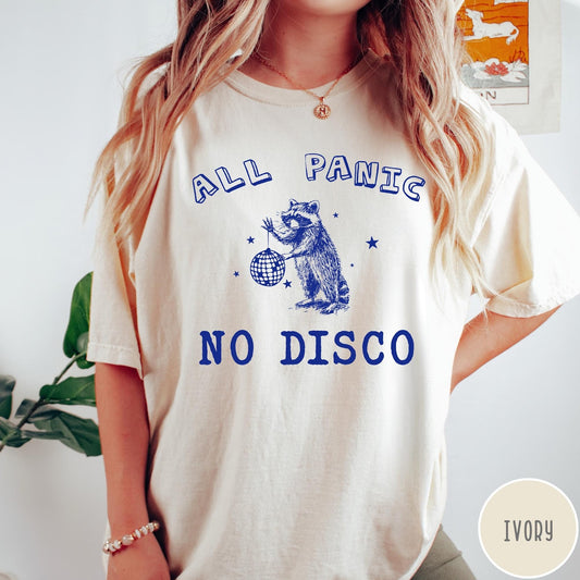 Comfort Colors tee in Ivory featuring screen printed raccoon graphic holding a disco ball with star accents