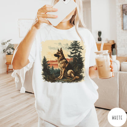 Comfort Colors tee in White featuring vintage style graphic of a German Shepherd sitting in a forest
