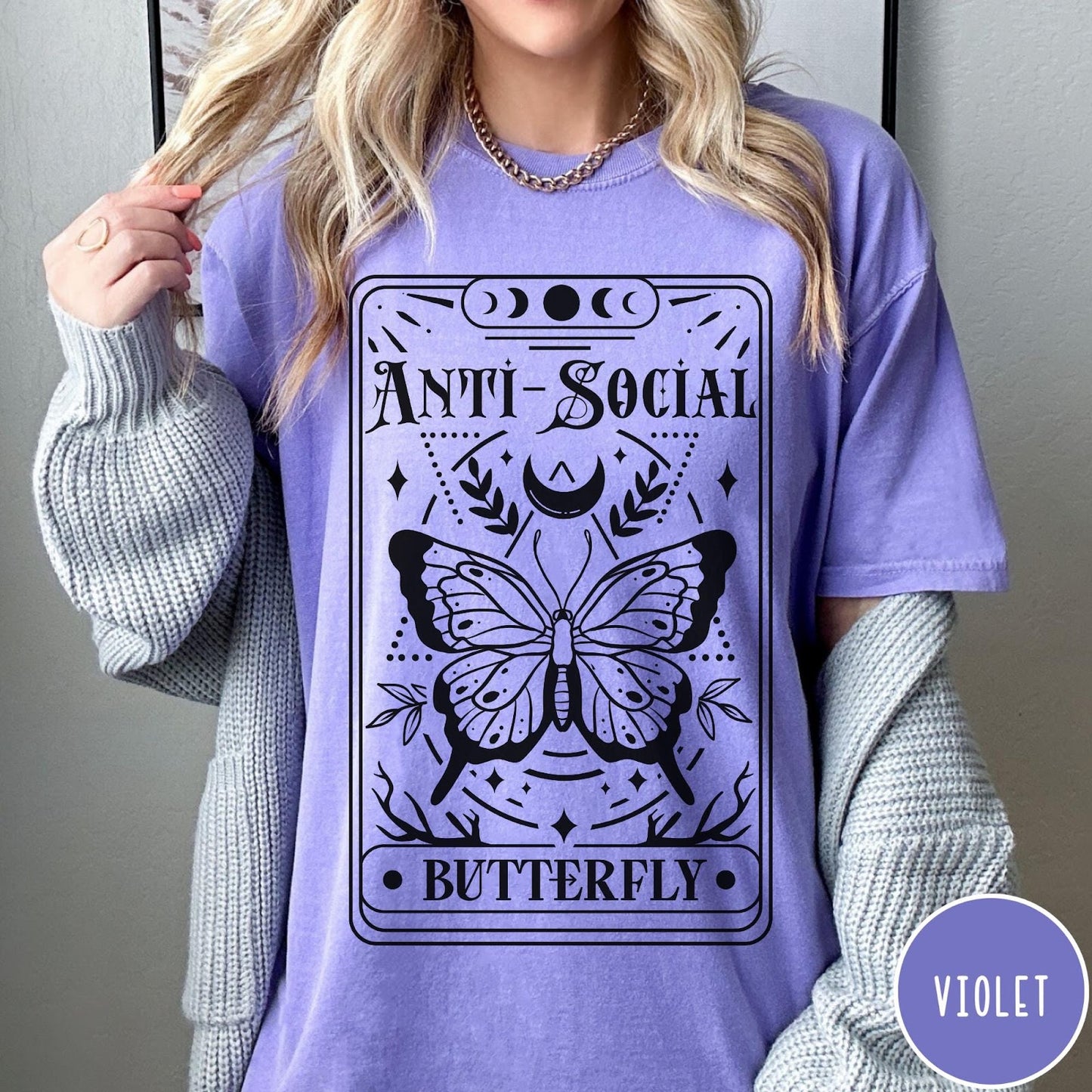 Comfort Colors tee in Violet featuring tarot card style graphic with butterfly and celestial moon phase design