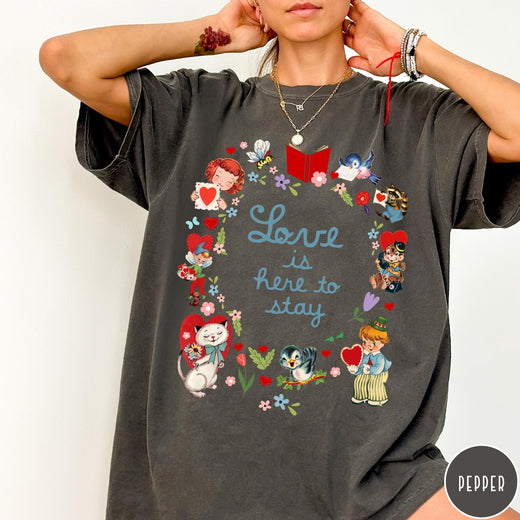 Comfort Colors tee in Pepper featuring vintage Valentine's collage with cute animals, flowers, and romantic text.