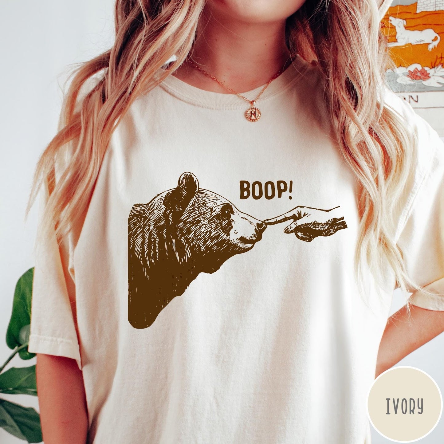 Comfort Colors tee in Ivory featuring a brown ink graphic of a human finger booping a bear nose