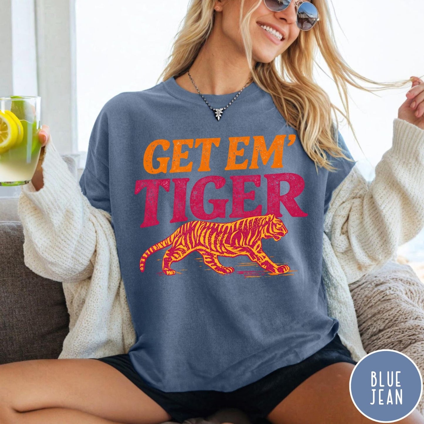 Comfort Colors tee in Blue Jean featuring vintage style graphic with Get Em Tiger text and tiger illustration
