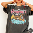 Comfort Colors tee in Pepper featuring retro graphic design of a roaring tiger resting on a cloud