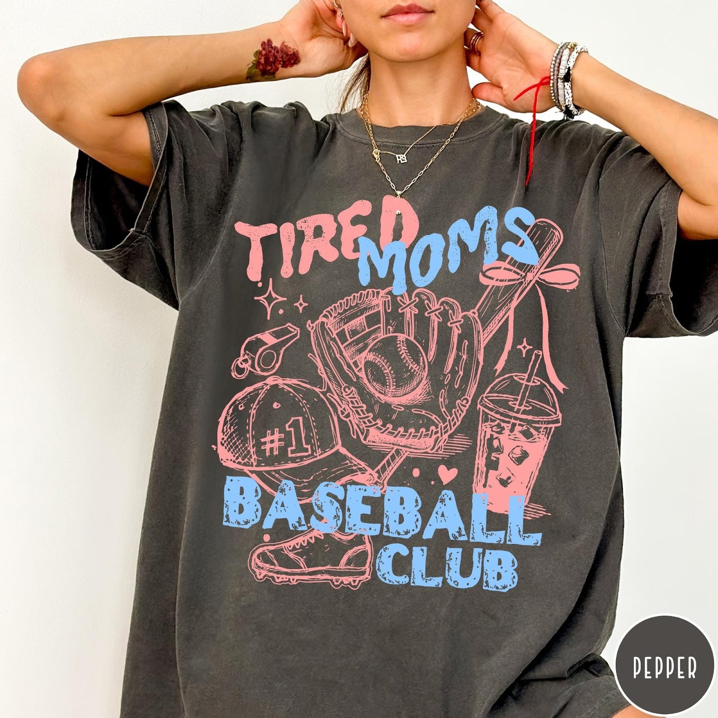 Comfort Colors tee in Pepper featuring baseball mom life graphic with glove, ball, cap, and iced coffee