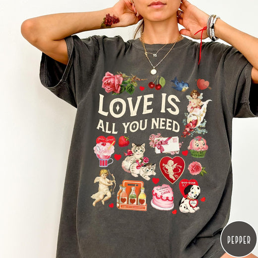 Comfort Colors tee in Pepper featuring Valentine's Day collage with kittens, cherubs, roses, and vintage graphic elements