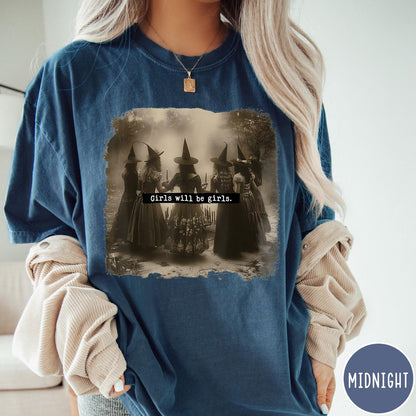 Comfort Colors tee in Midnight featuring vintage style graphic of five witches standing in a circle together