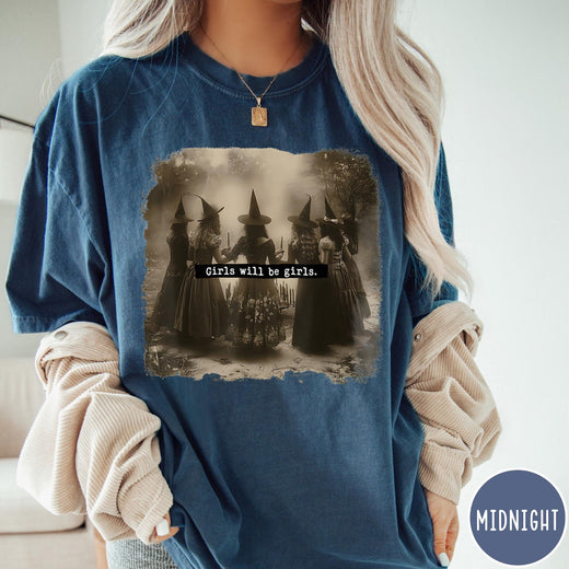 Comfort Colors tee in Midnight featuring vintage style graphic of five witches standing in a circle together