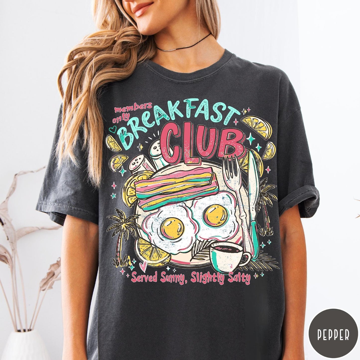 Comfort Colors tee in Pepper featuring retro breakfast food graphic with eggs, bacon, and coffee illustration