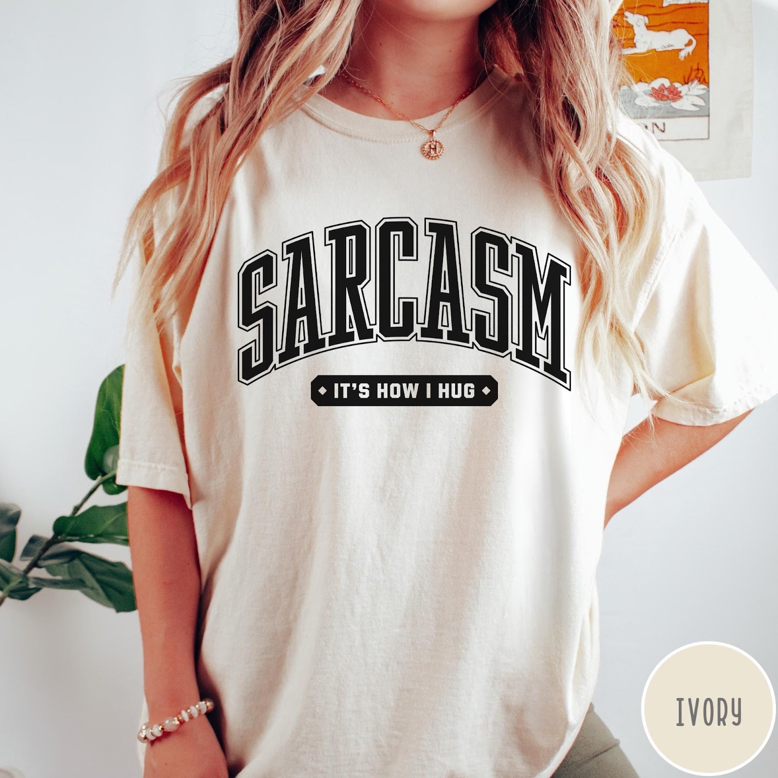 Comfort Colors tee in Ivory featuring collegiate style text reading Sarcasm It's How I Hug
