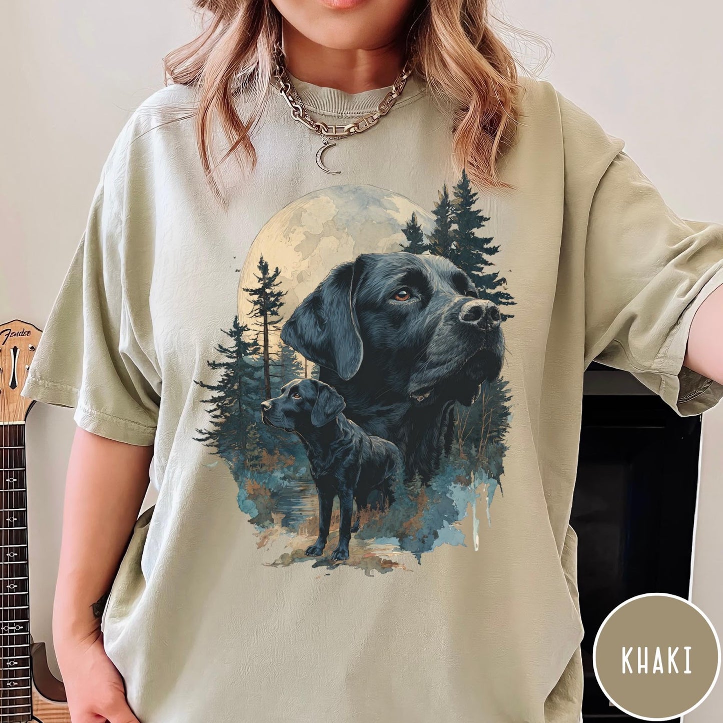Comfort Colors tee in Khaki featuring nature style graphic of black Labrador dogs in a forest moon scene