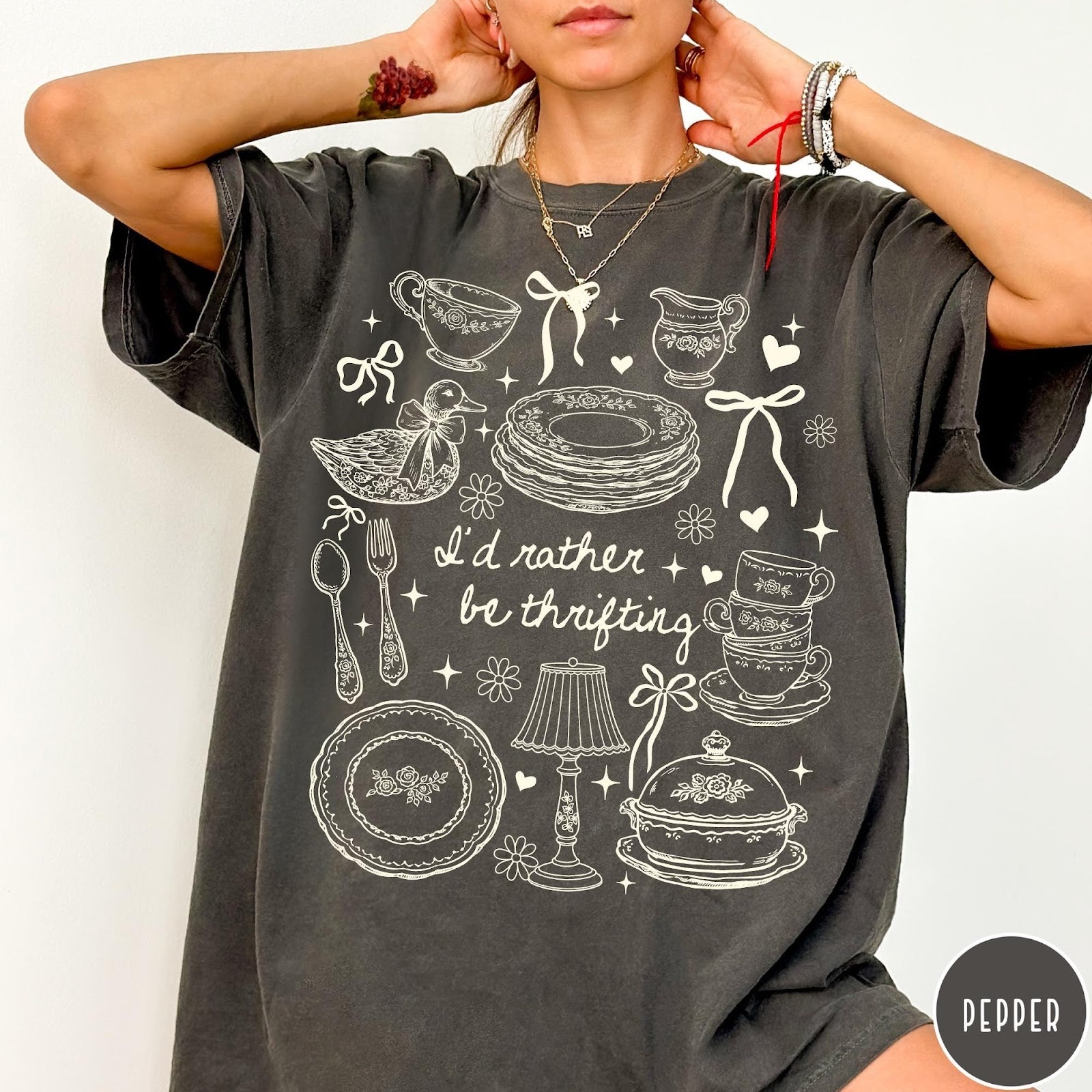Comfort Colors tee in Pepper featuring line art style thrifting and antique home goods graphic design