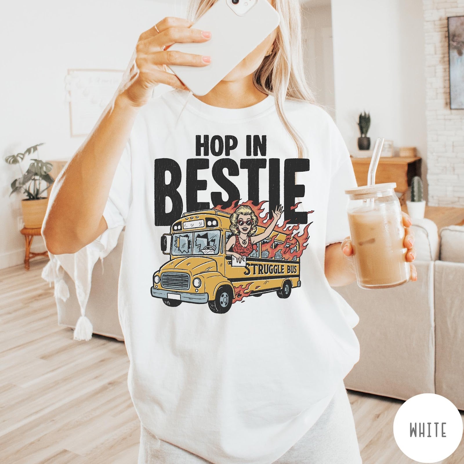 Comfort Colors tee in White featuring retro style graphic of a woman waving from a burning school bus