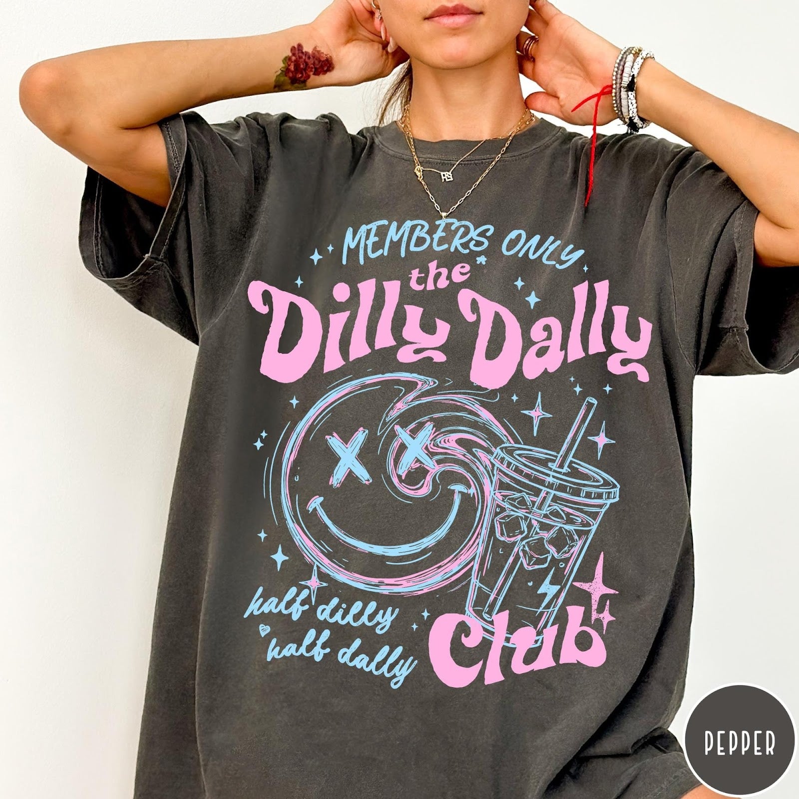 Comfort Colors tee in Pepper featuring retro style graphic with a smiley face and iced coffee cup