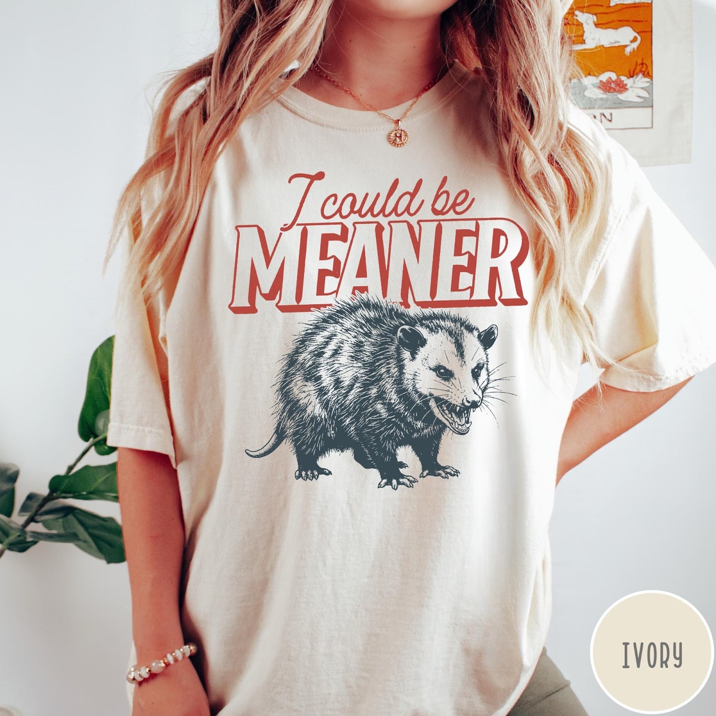 Comfort Colors tee in Ivory featuring screen printed opossum graphic with text I could be meaner