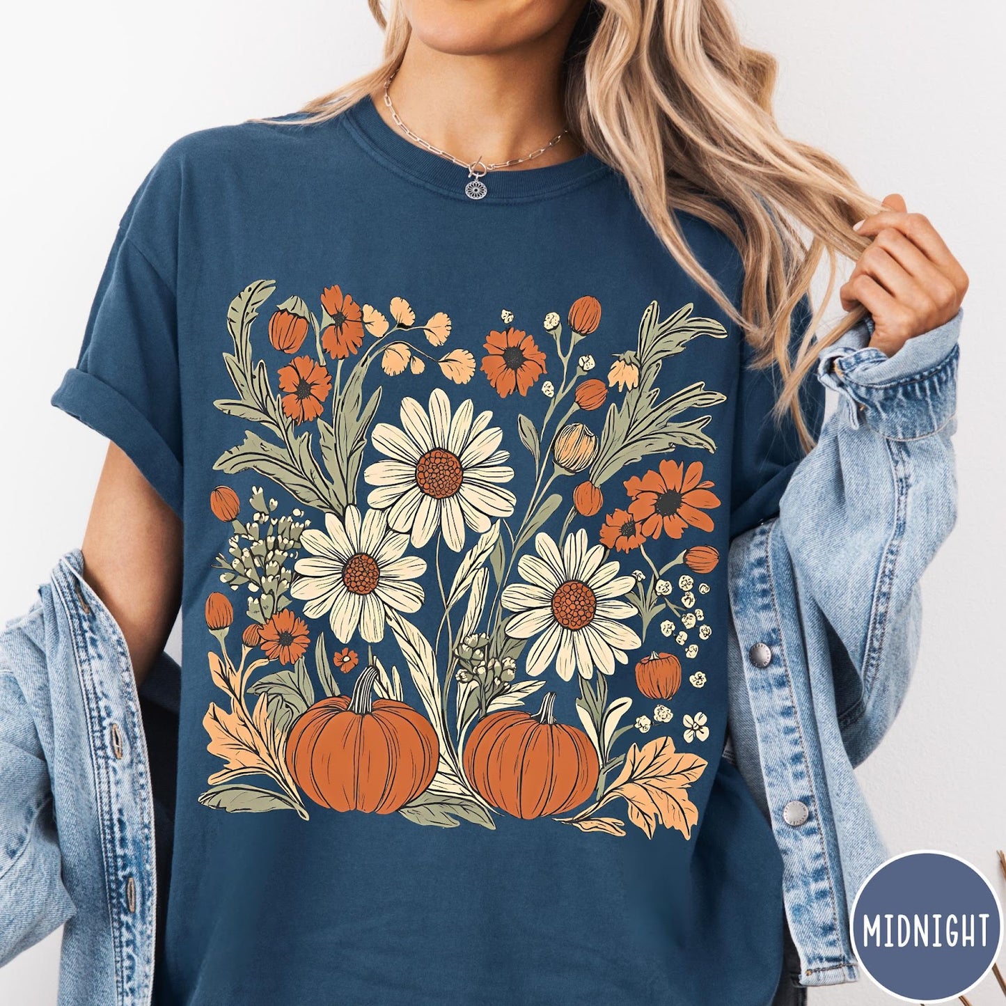 Comfort Colors tee in Midnight featuring boho floral design with pumpkins and daisies in fall colors