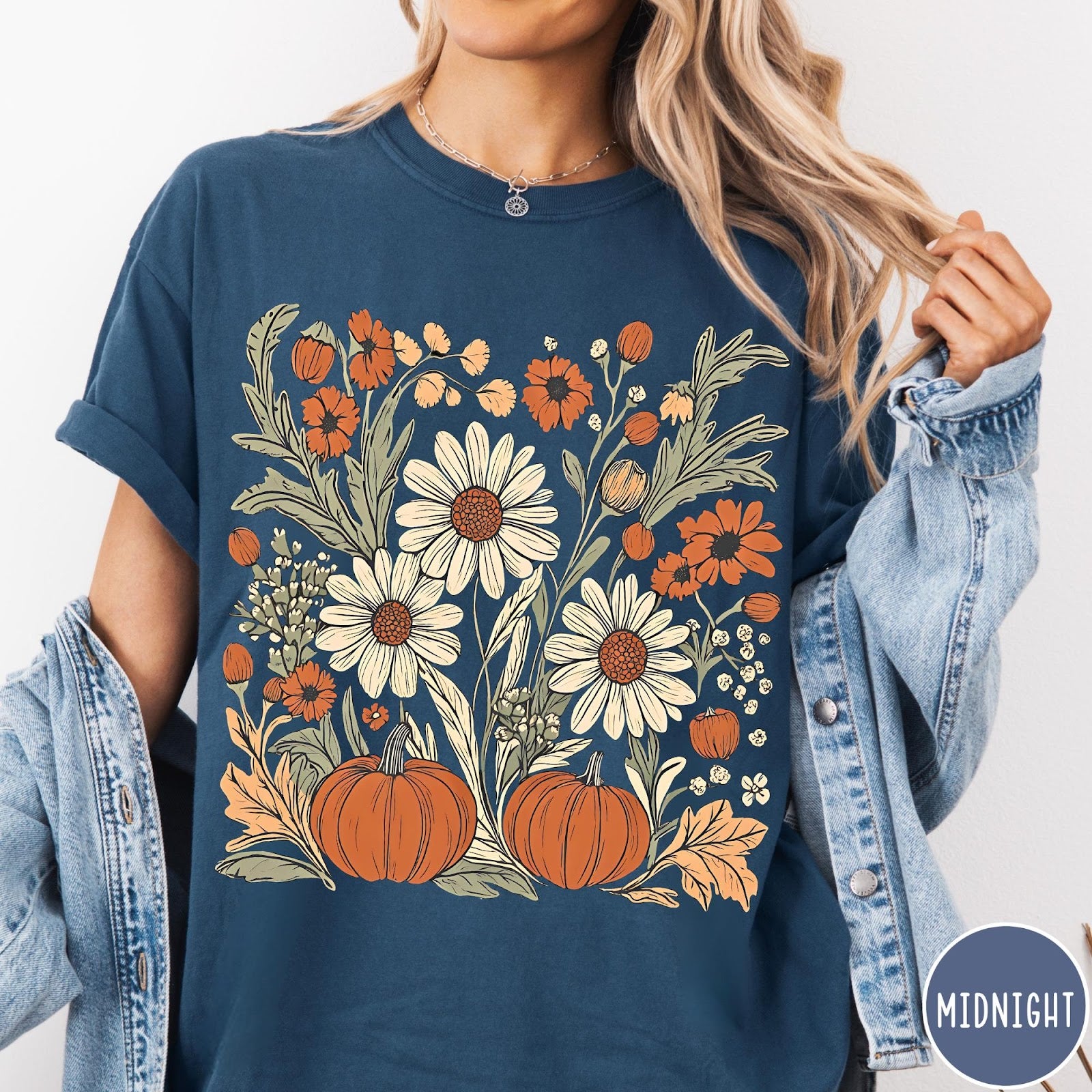Comfort Colors tee in Midnight featuring boho floral design with pumpkins and daisies in fall colors