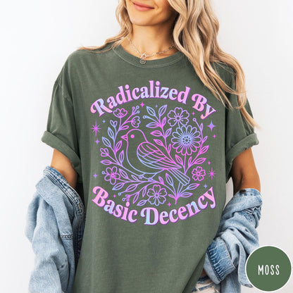 Comfort Colors tee in Moss featuring floral design style with a bird and flowers graphic print