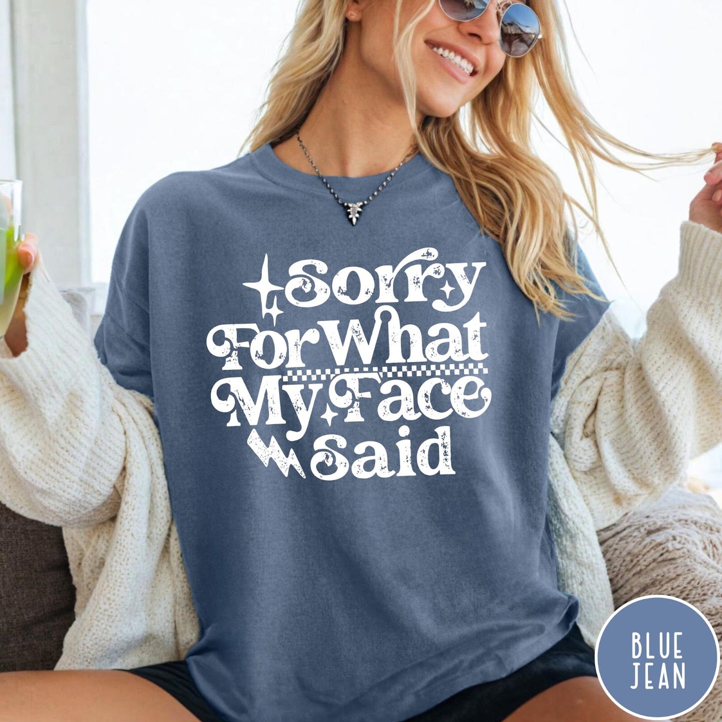 Comfort Colors tee in Blue Jean featuring sarcastic expression graphic with Sorry For What My Face Said text