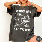 Comfort Colors tee in Pepper featuring illustrative style graphic of multiple sharks and text Sharks Will Kill You