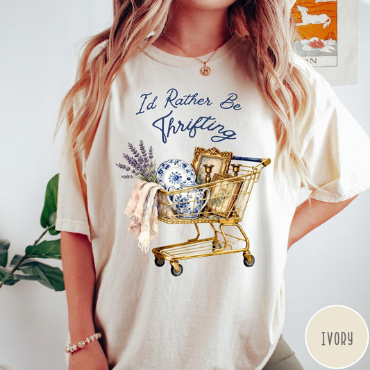 Comfort Colors tee in Ivory featuring vintage style graphic of a shopping cart filled with antique decor items
