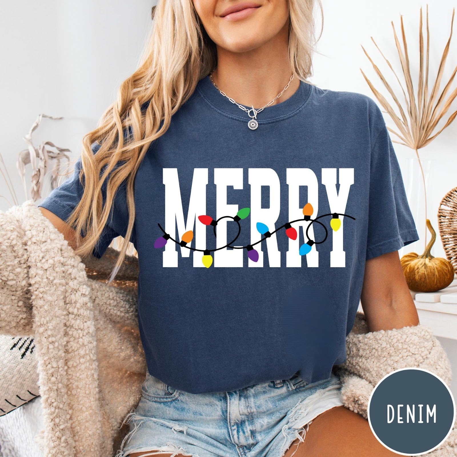 Comfort Colors tee in Denim featuring holiday style graphic with white Merry text and colorful Christmas lights
