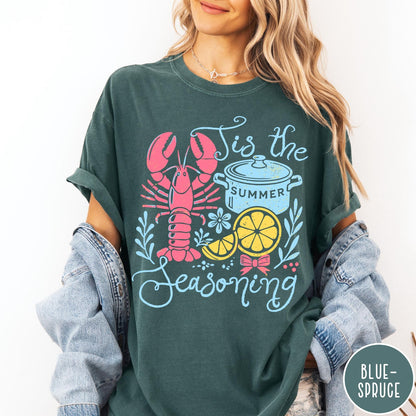 Comfort Colors tee in Blue Spruce featuring lobster boil graphic with lobster, pot, and lemon slices